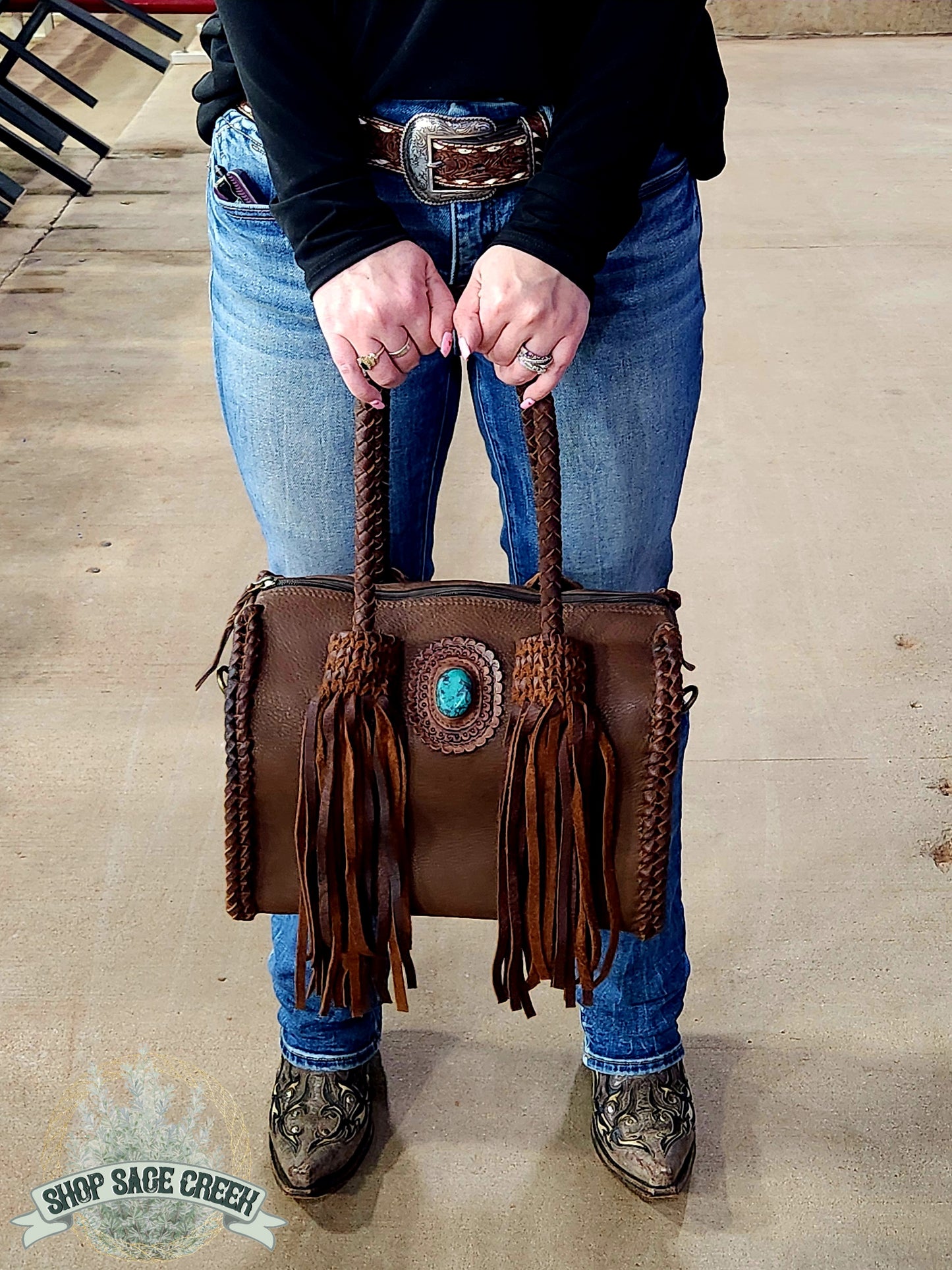 Western style brown leather purse with fringe
