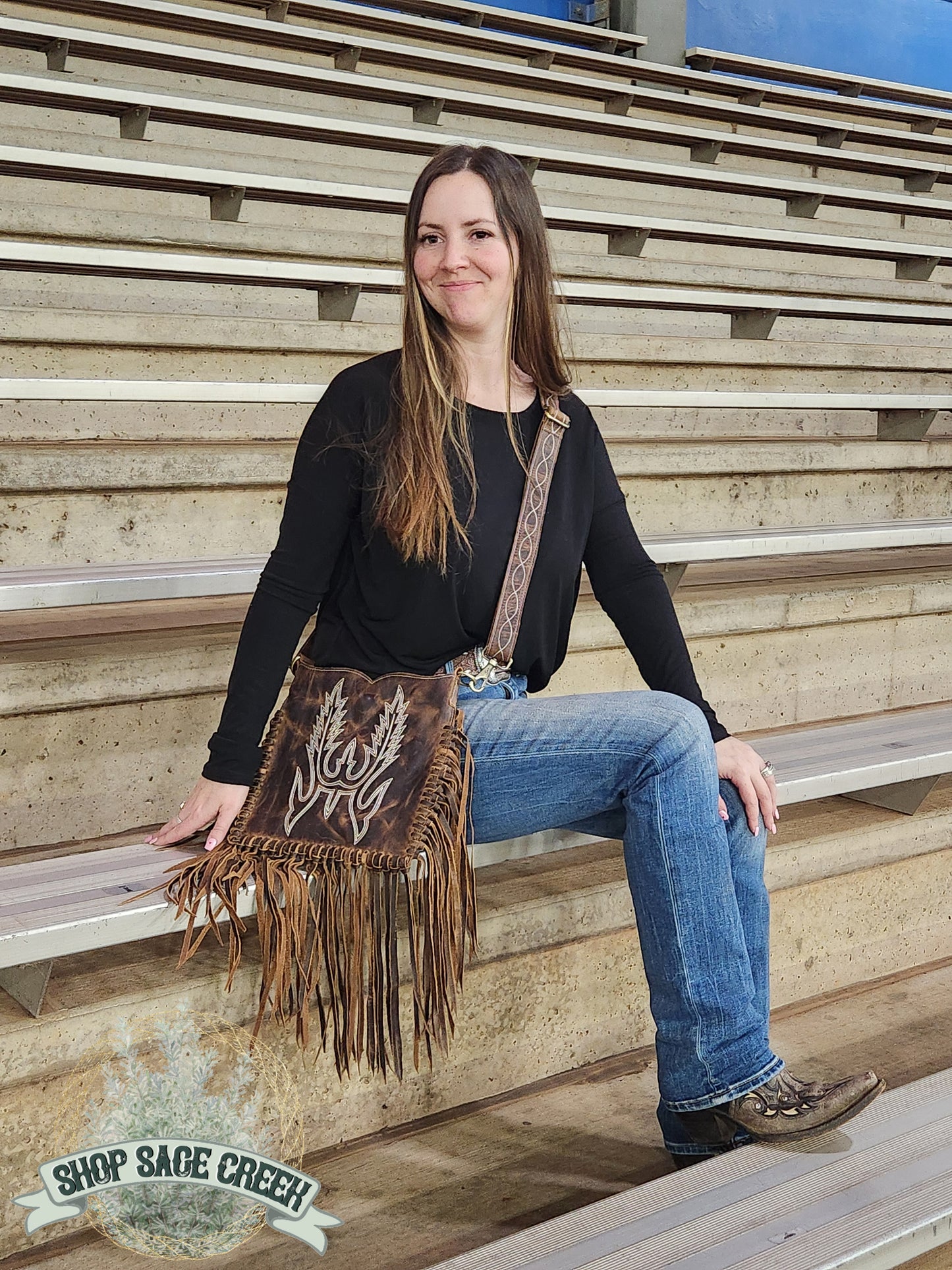Western style leather purse with fringe