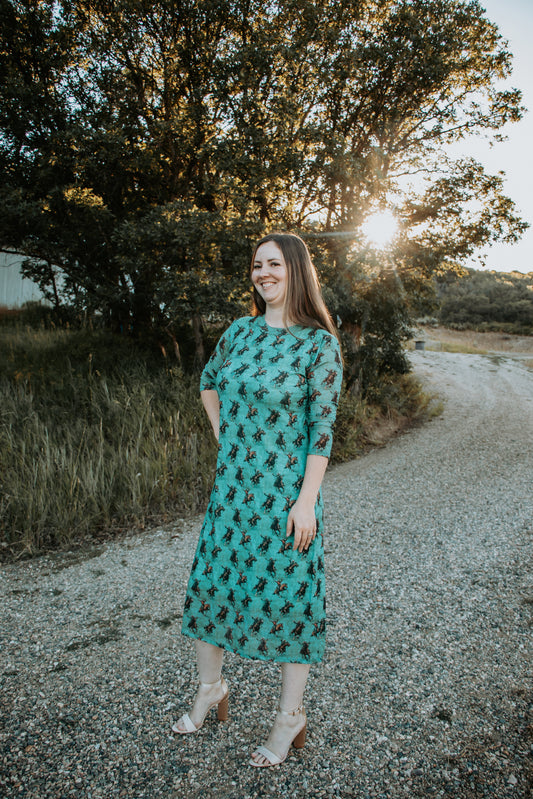 Turquoise mid sleeve dress with horses on it for women