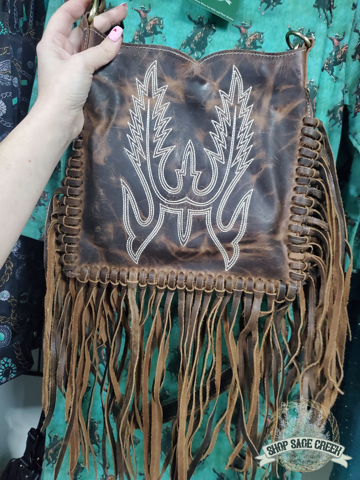 Western style leather purse with fringe